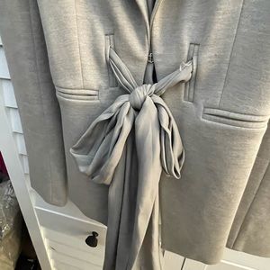 Elizabeth and James blazer size 4 with silk belt and silk lining.